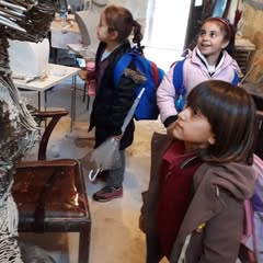 Children viewing sculpture